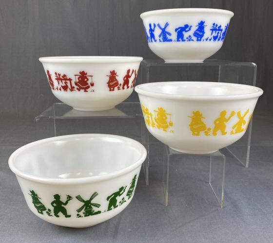 4 Hazel-Atlas Dutch Mixing Bowls - 4 Colors: Dutch Spring in 4 colors - red, yellow, blue and green. Each measures 4 1/2" tall and 9" in diameter at the top.