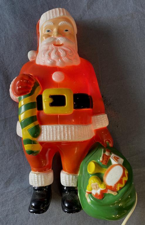 Early Lighted Blow Mold Hard Plastic Santa: Measures approximately 10" tall.