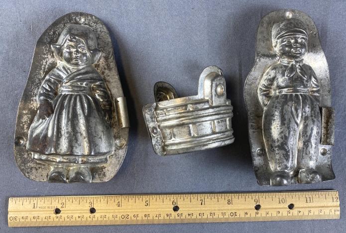 German Chocolate Molds Dutch Girl and Boy: Also includes a bucket mold. The boy and girl measure approximately 6" long.