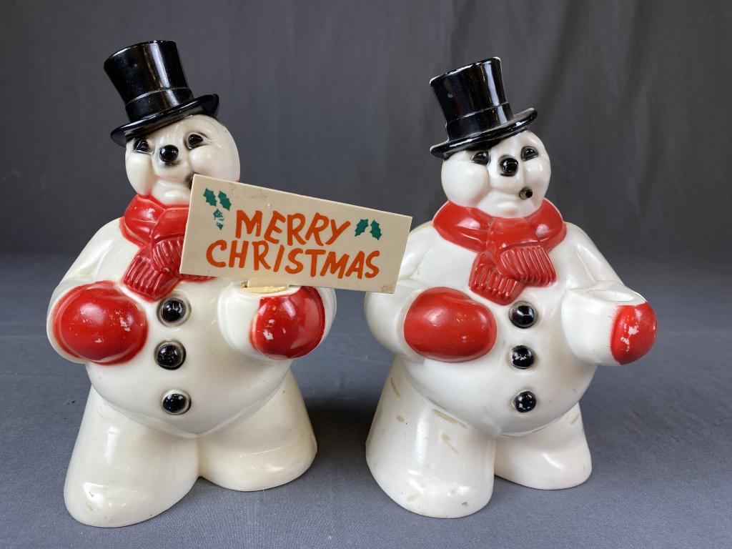 2 Vintage Hard Plastic Blow Mold Snow Men: Each measures approximately 7" tall. That can be lighted through the hole in the back (lights not included). A merry Christmas flag for one of them is included.