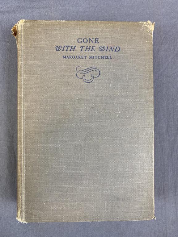 Gone With The Wind First Edition First Printing: "Gone With the Wind" by Margaret Mitchell dated May 1936 making it a first edition from the first printing, one of 3000. Hardcover without its dust jacket, the binding is a bit rough as shown with wea