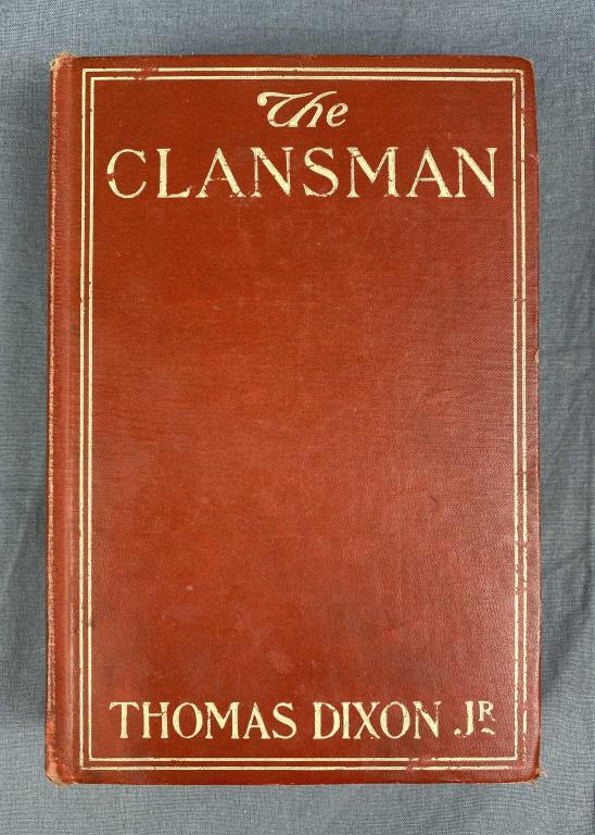 The Clansman Thomas Dixon Jr. 1903: Hardcover, wear and damage as shown. Dated 1903.