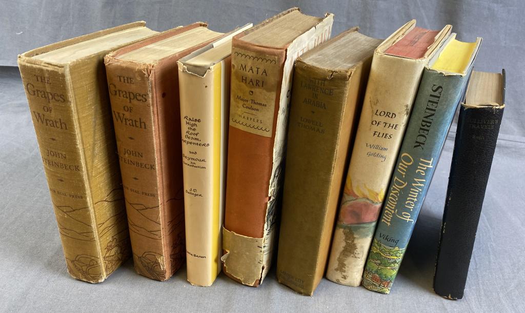 Group of 8 Vintage Classic Novels: Includes 2 copies of "The Grapes of Wrath", "Raise the Roof Beam Carpenters", "Mata Hari", "With Lawrence in Arabia", "Lord of the Flies", "The Winter of our Discontent" and "Gulliver's Travels". See 