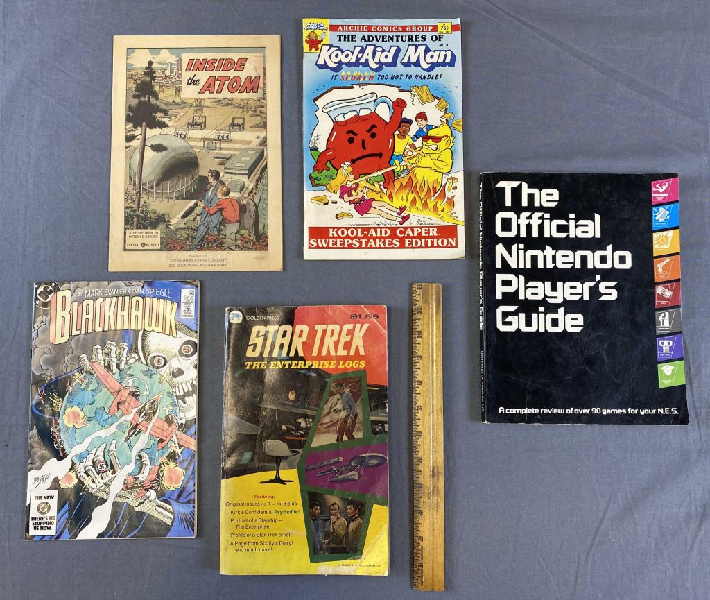 Vintage Comic Books - Star Trek, Nintendo Guide: Includes a "Star Trek The Enterprise Logs" Dated 1976, a "Nintendo Official Player's Guide" dated 1987, a 1950s Nuclear power comic and more as shown.