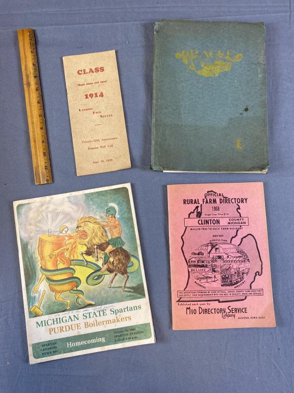 4 Pieces of Lansing Michigan Area Ephemera: Includes a 1912 Lansing High School "Oracle" yearbook, a 1914 25th reunion program also from Lansing High School, a Michigan State Spartans magazine and a Clinton County Rural directory.
