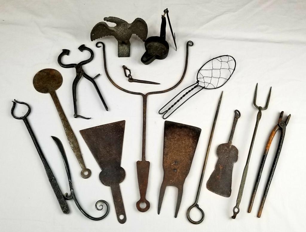 15 Piece Wrought Iron Collection: 15 Piece Wrought Iron Collection – Primarily Early 19th C. Includes: Sugar Nippers, Betty Lamp, Pot Lifters, Scrapers, Etc., Various Sizes. SHIPPING: Shipping Handled In-House by Epic