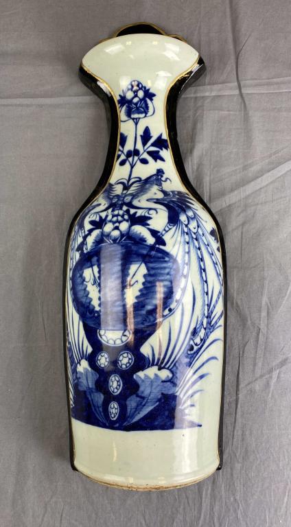 Chinese Antique Porcelain & Lacquer Wall Vase: Comprised of a portion of an antique hand painted Chinese vase mounted on a lacquer base. H. 25 1/2", W. 9". SHIPPING: In House Shipping Available.