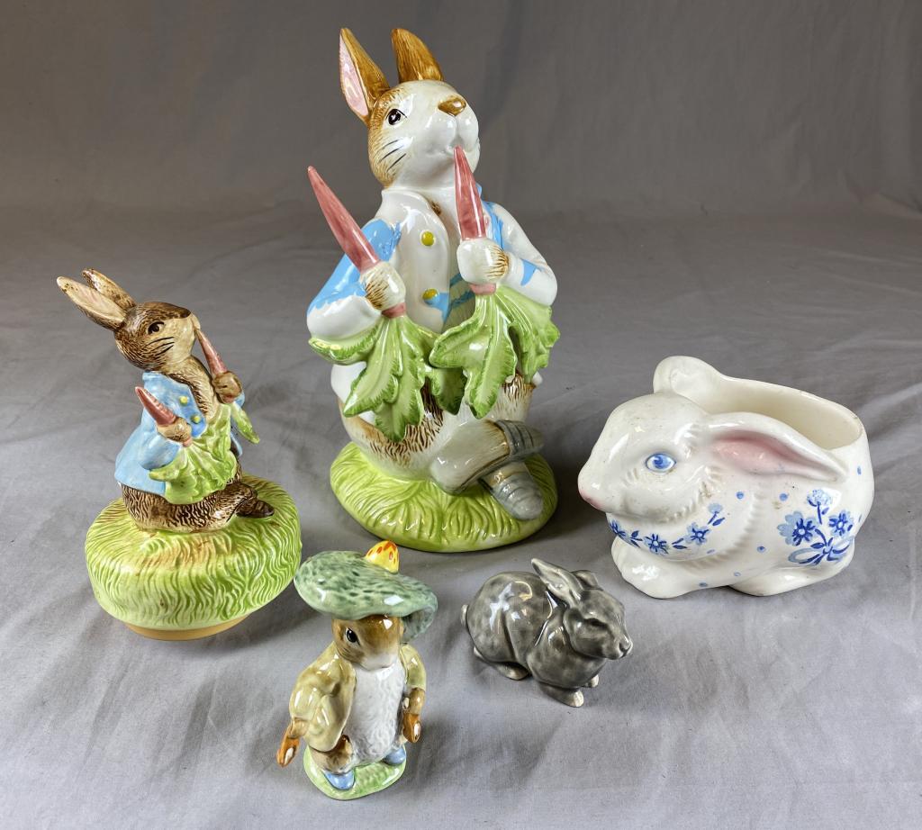 Collection of Vintage Bunny Figurines REO: From an estate of the family of RE Olds of Lansing Michigan. A collection based on a family nickname. Includes a Schmid music box (Plays "It's a Small World") a large Schmid rabbit, a Beswick Beatrix