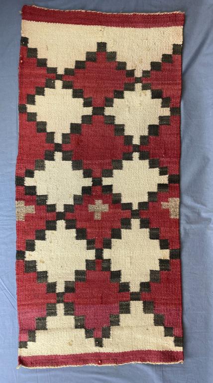 Antique Hand Made Navajo Rug 42" x 19": Some spotting as seen in photos. A burlap sleeve has been added to the back for hanging. SHIPPING: In House Shipping Available.