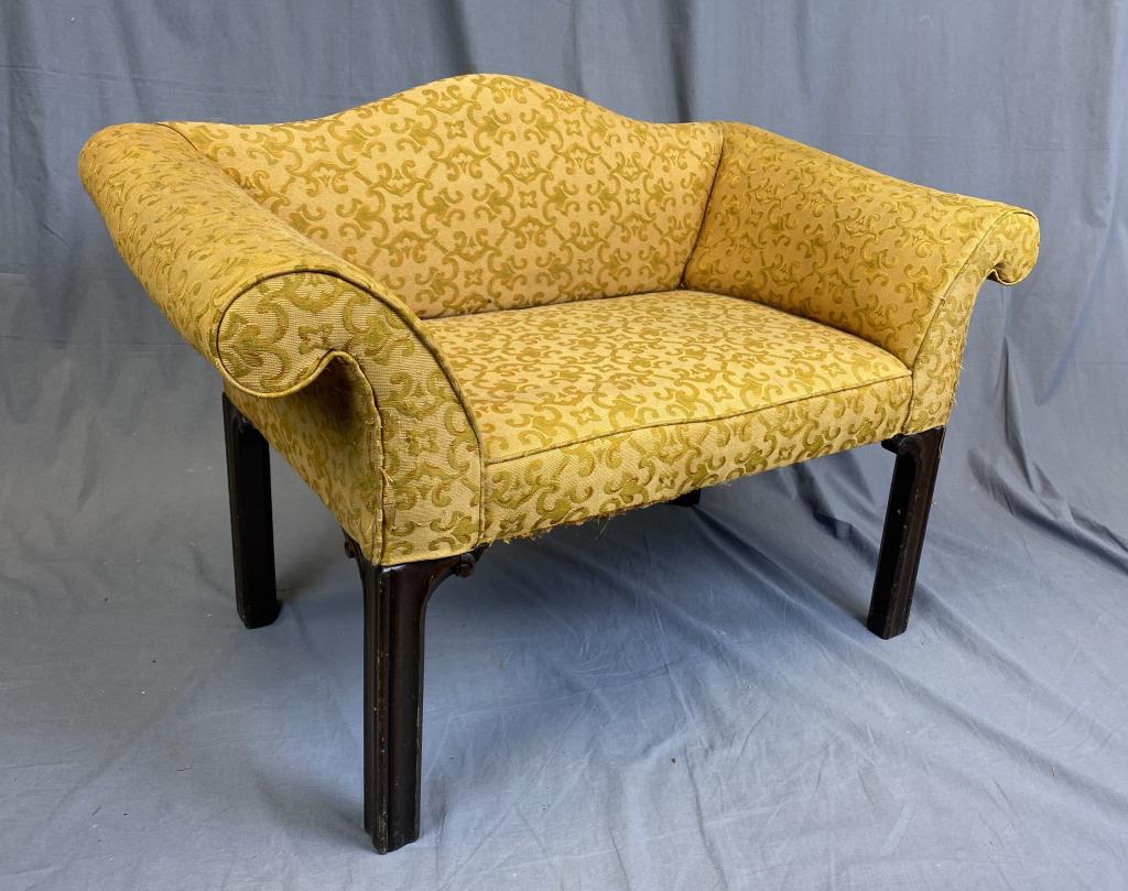 Chippendale Style Camel Back Upholstered Bench REO: From an estate of the R.E Olds family of Lansing Michigan. Upholstery as found with considerable wear as shown. H. 26", W. 38", D. 21". SHIPPING: Item may be shipped via U-Ship or the Battle Creek Pak