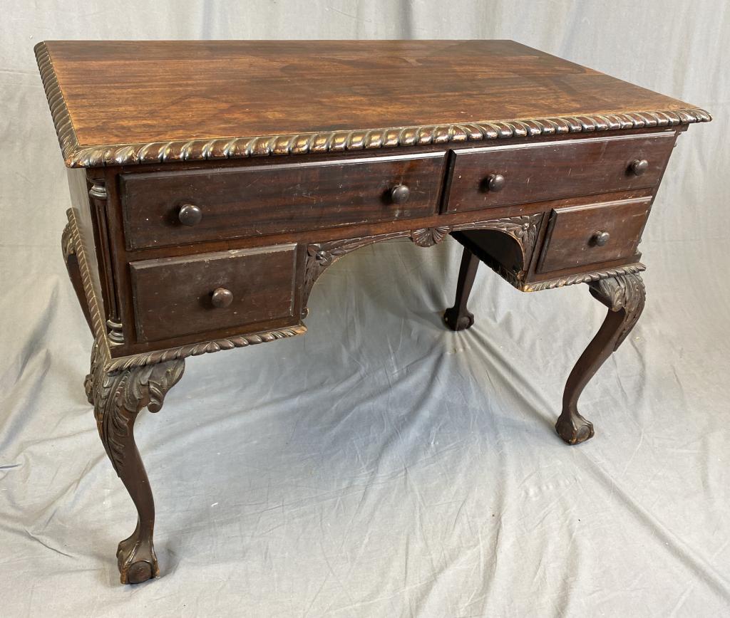 1920s Mahogany Chippendale Style Lowboy REO: From an estate of the family of R.E. Olds of Lansing Michigan. H. 31", W. 40 1/2", D. 22". Some wear and damage as shown in photos. SHIPPING: Item may be shipped via U-Ship or the Battle Creek Pak Mai