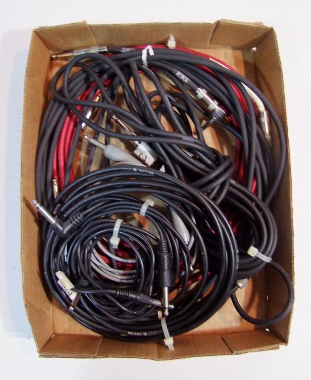 Group of Seven ¼” Guitar Amp Cords: Group of 7 ¼” Guitar Amp cords of various lengths. Shipping Handled by Auction House.