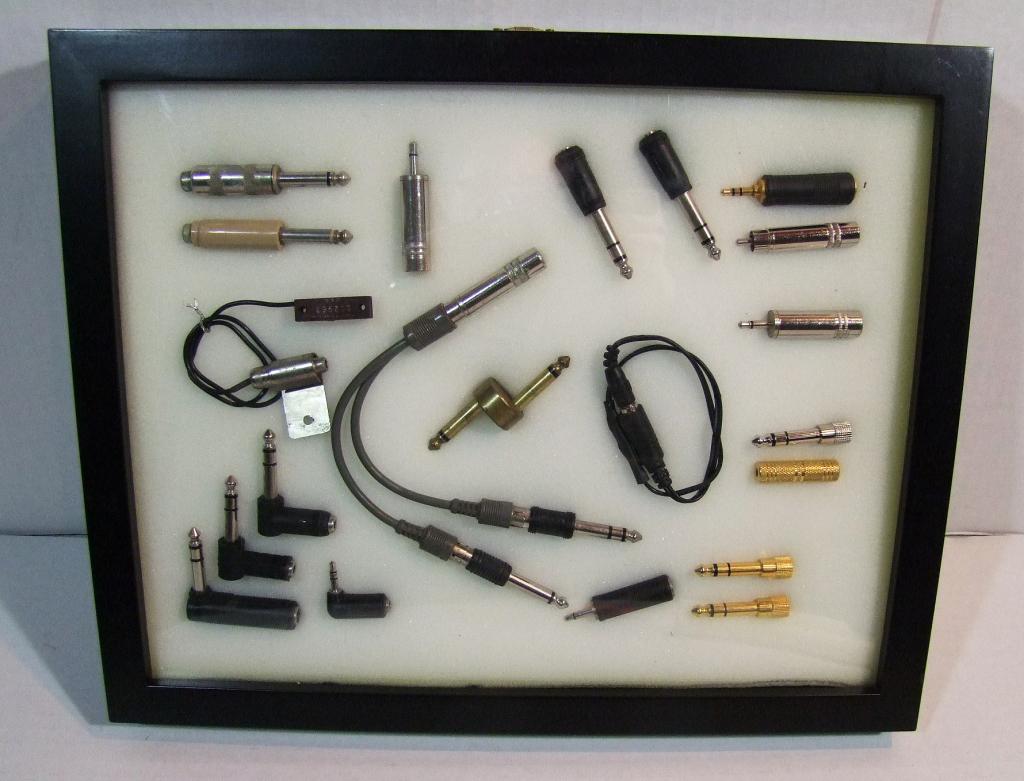 Display of ¼” and ½” Amp Plugs, Small Pick-up, etc (1 of 2)