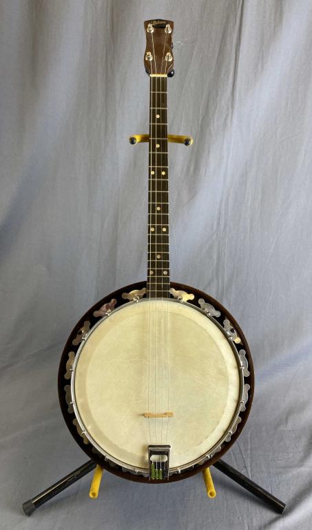 1940s Michigan Tenor Banjo B.&S.L.: Beare and Sons Ltd. with original case. Length 33". Shipping Handled by Auction House.