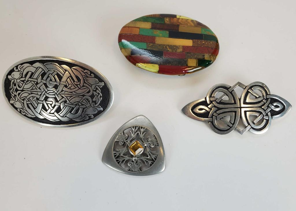 Vintage Lot Of Celtic Pewter Jewelry: (1) pendant Ceard made in Scotland, (1) brooch marked St.Justin, (1) hairpiece by Sustin Pewter and one unique belt buckle.