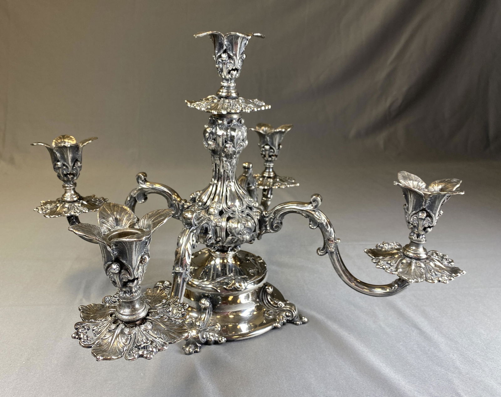 Reed & Barton Silver Plated Epergne/Candelabra: An ornate Art Nouveau style silver plated epergne or candelabra from Reed & Barton. Measures 12 1/2" tall and 20" wide.