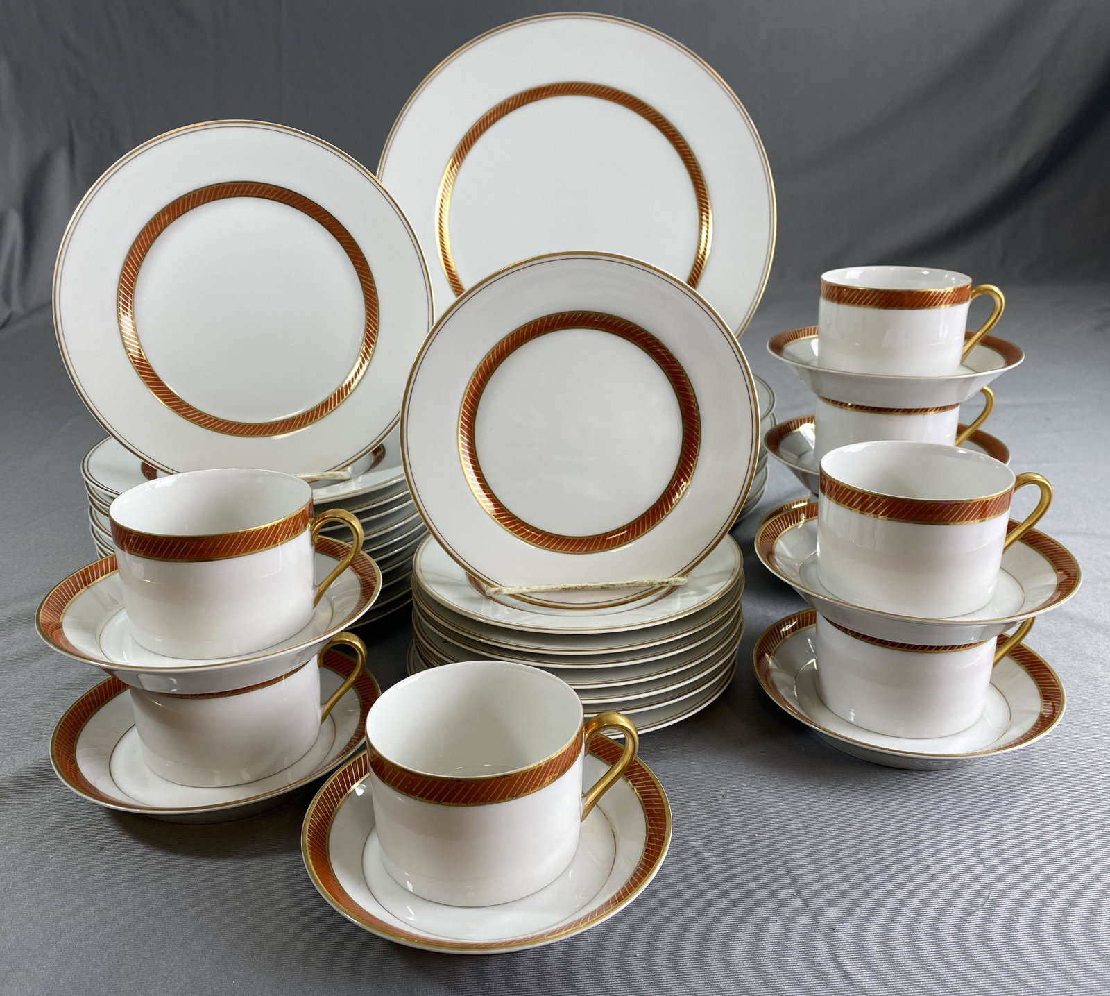 Fitz and Floyd Bordure Rouge Place Settings for 8+: Includes: (8) 10 1/4" dinner plates, (11) 7 1/2" salad plates, (8) 6 1/2" bread and butter plates, (8) flat cups and saucer sets.