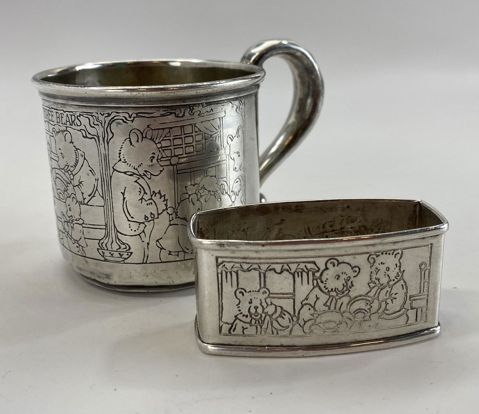 Webster Sterling 3 Bears Childs Cup, Napkin Ring: The cup measures 2 1/2" tall and weighs 51 grams. The napkin rind is 2 1/4" wide and weighs 19 grams.