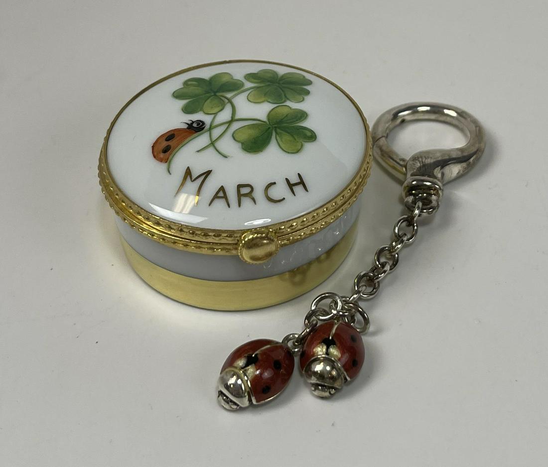 Tiffany & Co Ladybug Pillbox & Key Ring: Tiffany & Co Limoges Ladybug pillbox and key ring. The pillbox measures 2" in diameter. Total length of the key chain is 3 3/4".