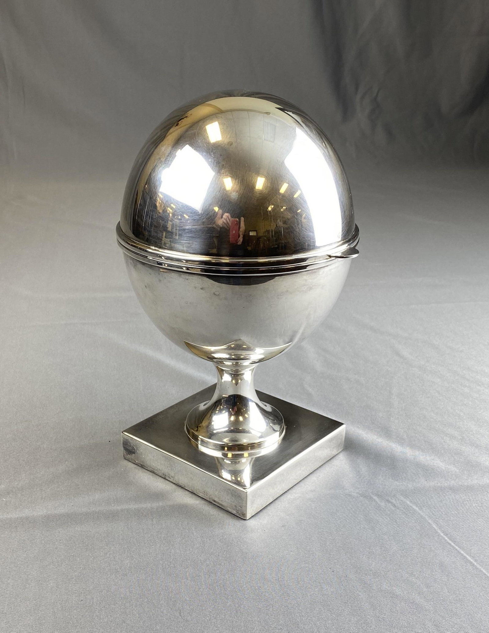 St. James Silver Plated Caviar Server: A silver plated egg shaped caviar server/cooler from St. James made in Brazil. It measures 11 1/2" tall.