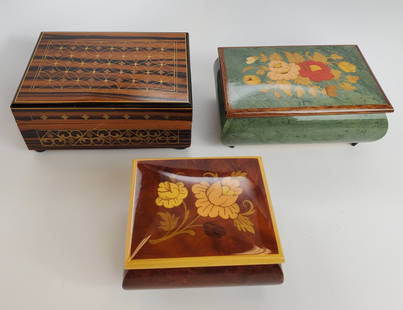 Vintage Wooden Music Jewelry Boxes Lot Of 3: (1) wooden copper inlay footed Marquetry mosaic . Made in Switzerland Swiss musical movement " Leibesfreud Town of Dreams" 5 3/4" length 2 1/4" depth 2 1/2" height. (1) footed music/Jewelry box