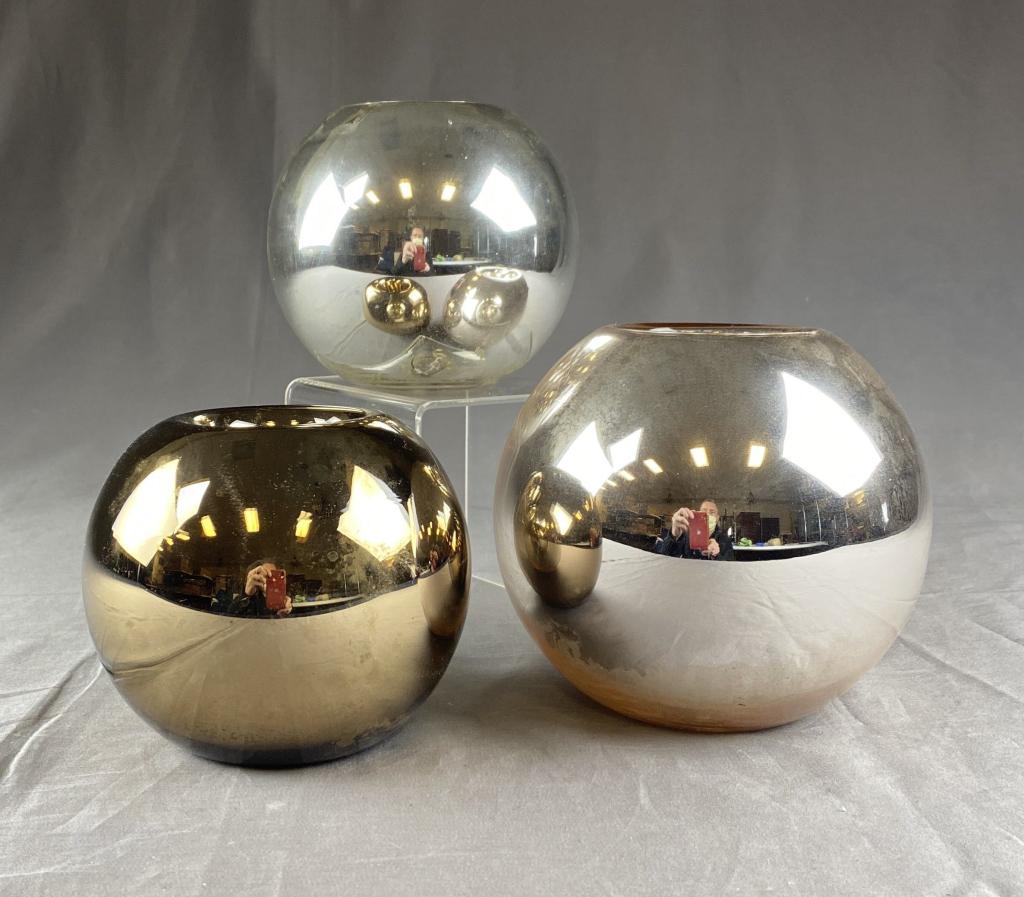 3 Vintage Orb Shaped Mercury Glass Vases: In silver, pale pink and bronze colors. The tallest measures 5-1/4". Shipping: In-House Shipping Offered