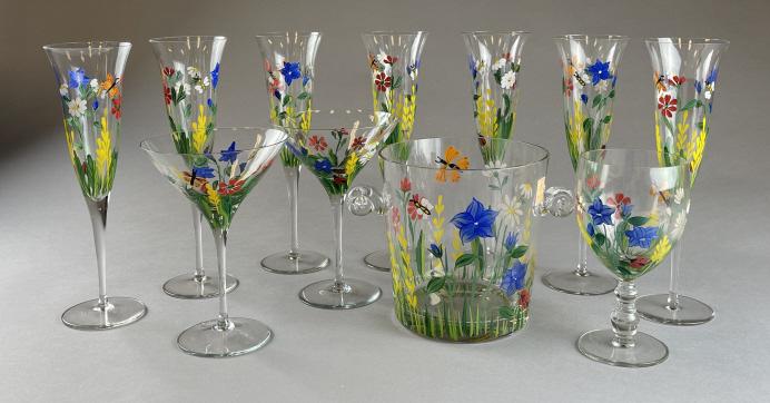 Royal Danube Hand Painted Floral Crystal: Appears to be the RDZ19 pattern. Includes: 7 champagne flutes 2 martini glasses 1 wine glass 1 ice bucket The champagne flutes are 9-7/8" tall.
