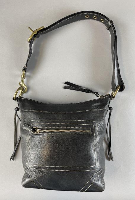 Coach Leather Chelsea Black Laced Crossbody Bag: Measures approximately 11.5 W, 10.5 H and 2.5 D.