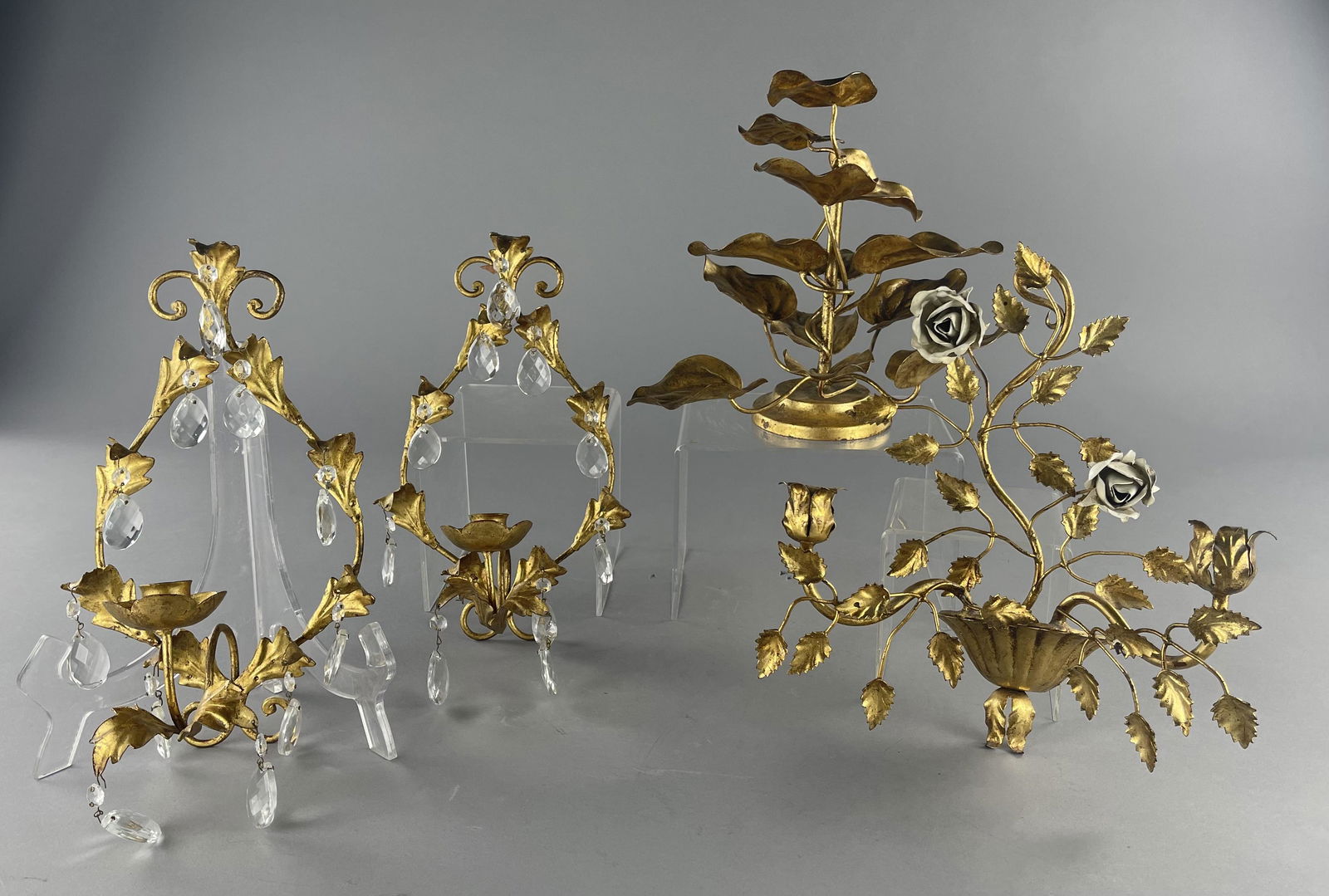 Italian Gilt Tole Decorative Objects: Includes 3 candle wall sconces and a leaf form sculpture or server. The leaf sculpture measures 11-1/2" tall. Shipping: In-House shipping available for this lot. Please read the shipping section in ou