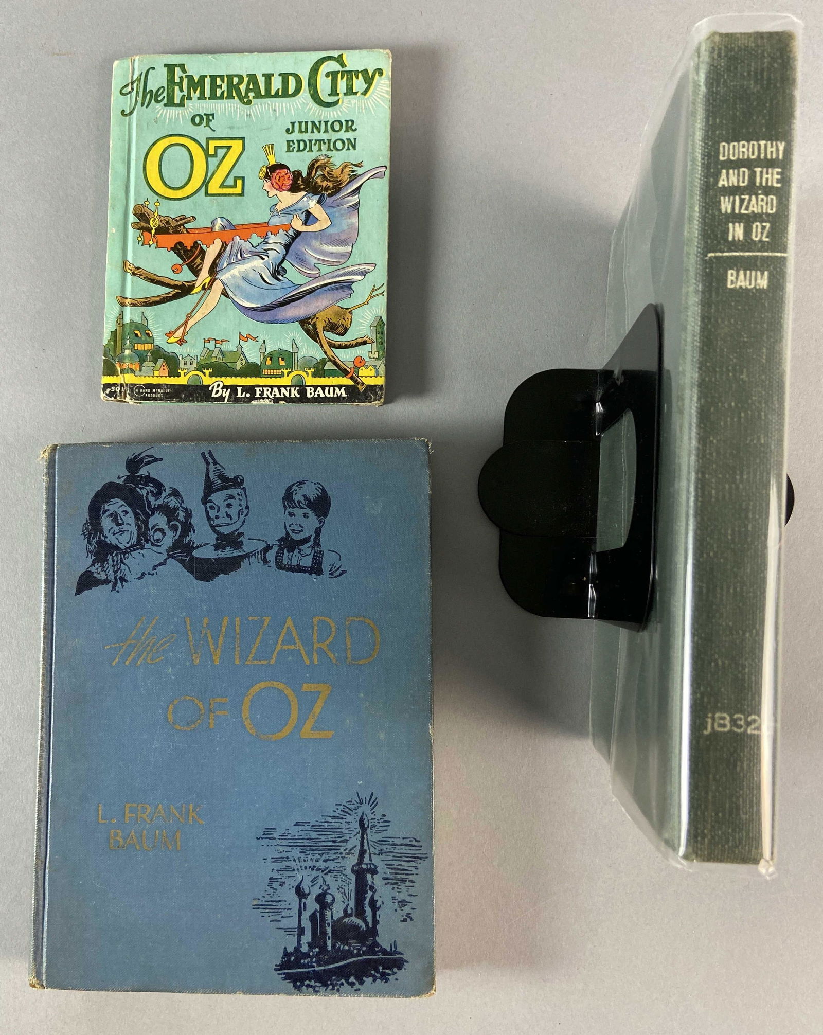 Wizard of Oz Lot of Three Books: Three Books from the Oz Series by L Frank Baum. Emerald City of Oz Junior Edition, published by Rand McNally in Chicago, 1939 USA Edition. Wizard of Oz, published by Bobbs-Merrill of Indianapolis 1944