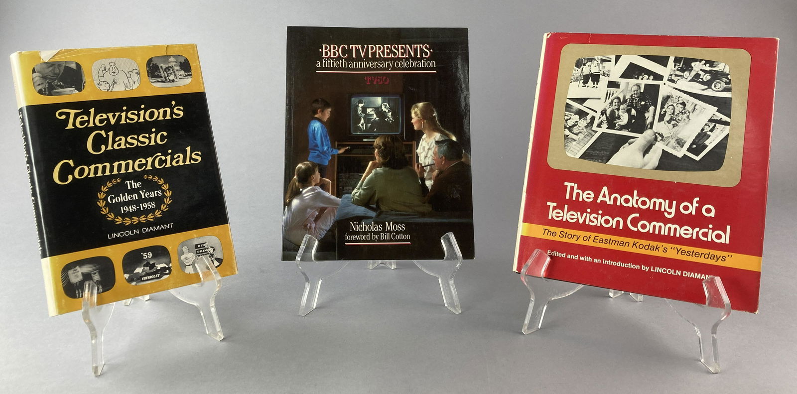 Vintage First Edition Television Books: Three books from the 1970's and 1980's on the history of television. Anatomy of a Television Commercial by Lincoln Diamant. Published by Hastings House in New York, 1970. First edition. BBC TV Present