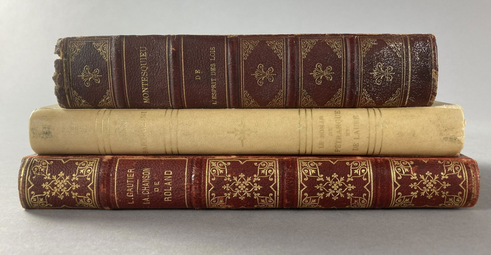 Three French Language Books: La Chanson De Roland (Song of Roland) by Leon Gautier, published by Tours Alfred Mame et Fils 1883, 13th edition. Le Roman de Petrarque et De Laure 1327-1348 by Jean Bartholonie, published by Albert M