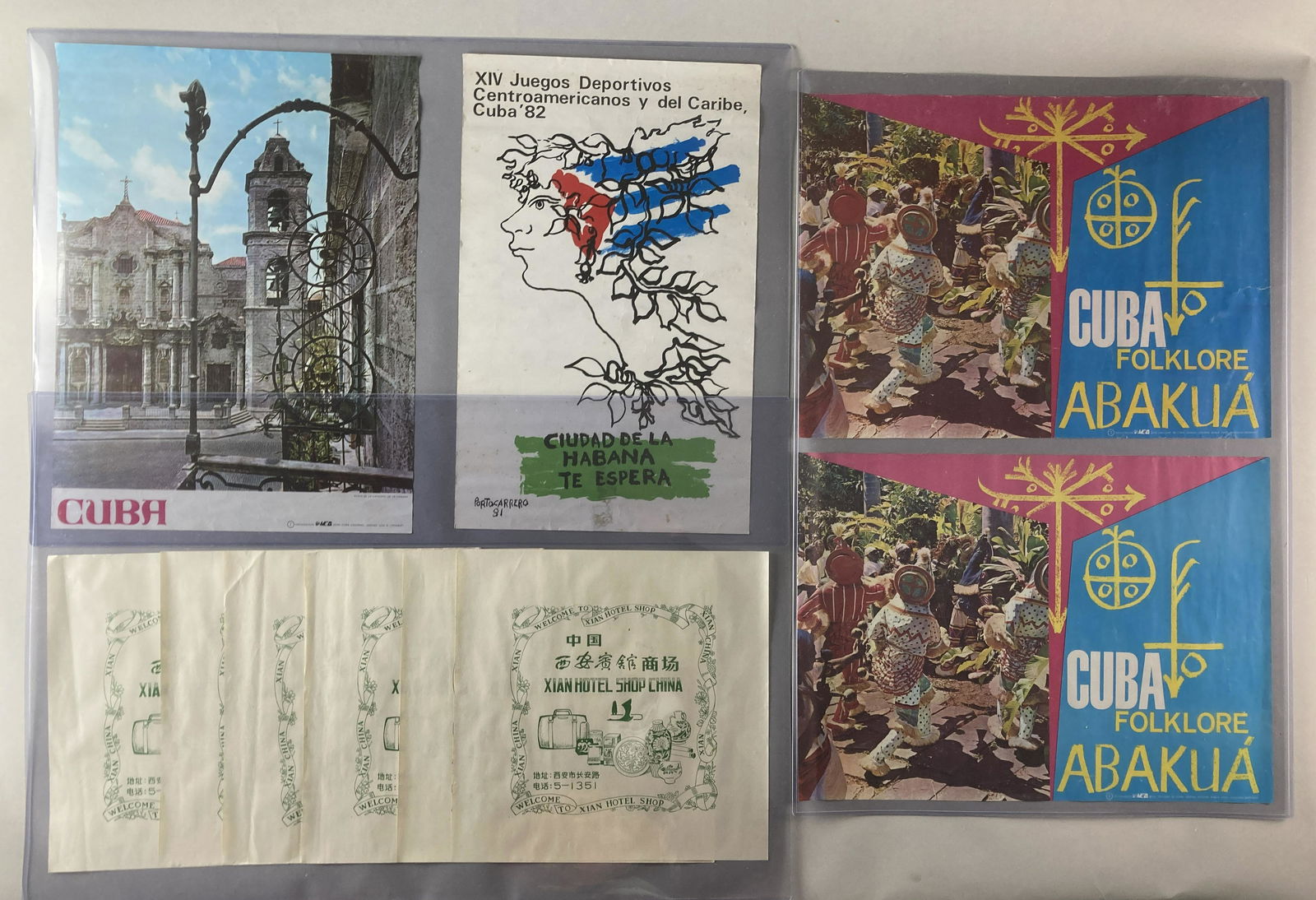 Cuba And China Tourism Posters: Four posters related to Cuba and six tourism signs from China.Cathedral of Havana Travel Poster from the Colonial Series by Luis G Fresquet, circa 1980, 17 X 23 inches in size. Cuba Folklore Abakua Tr