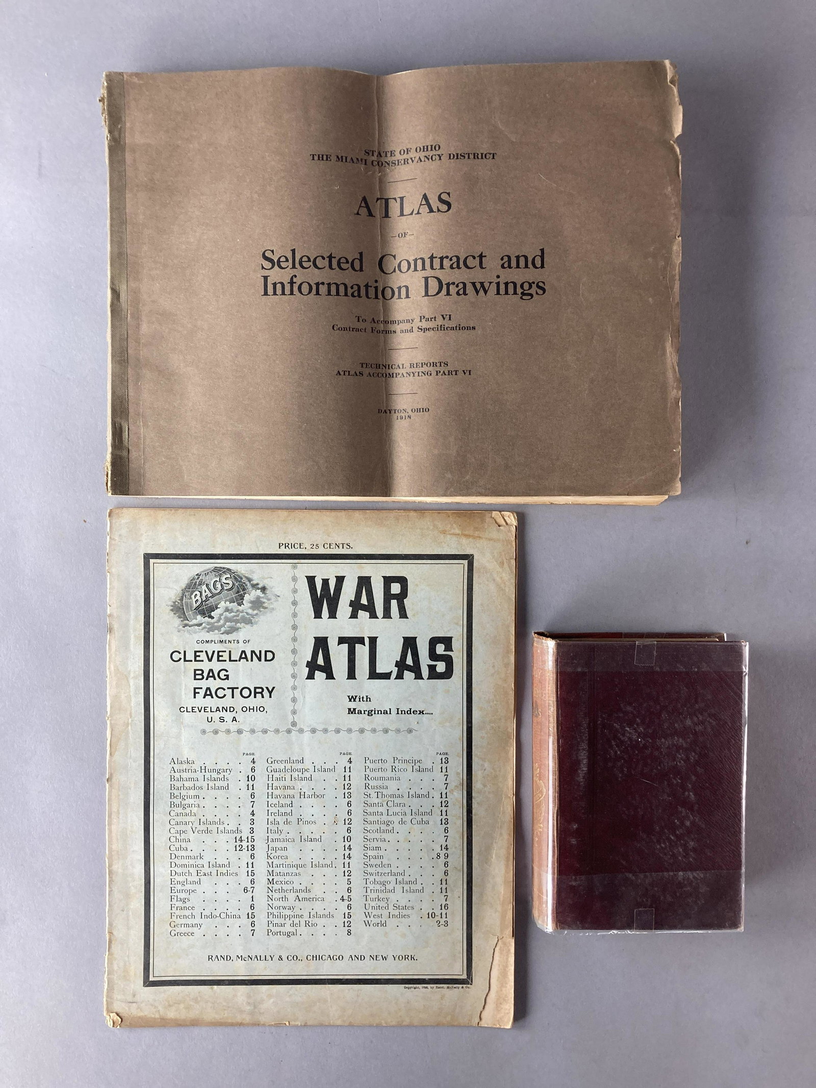 Three 19th & Early 20th Century Atlases: Set of three atlases, two 19th century, one early 20th century.Handy Reference Atlas of the World by John Bartholomew, published by John Walker & Co, 1888.Atlas of Selected Contract and Information Dr