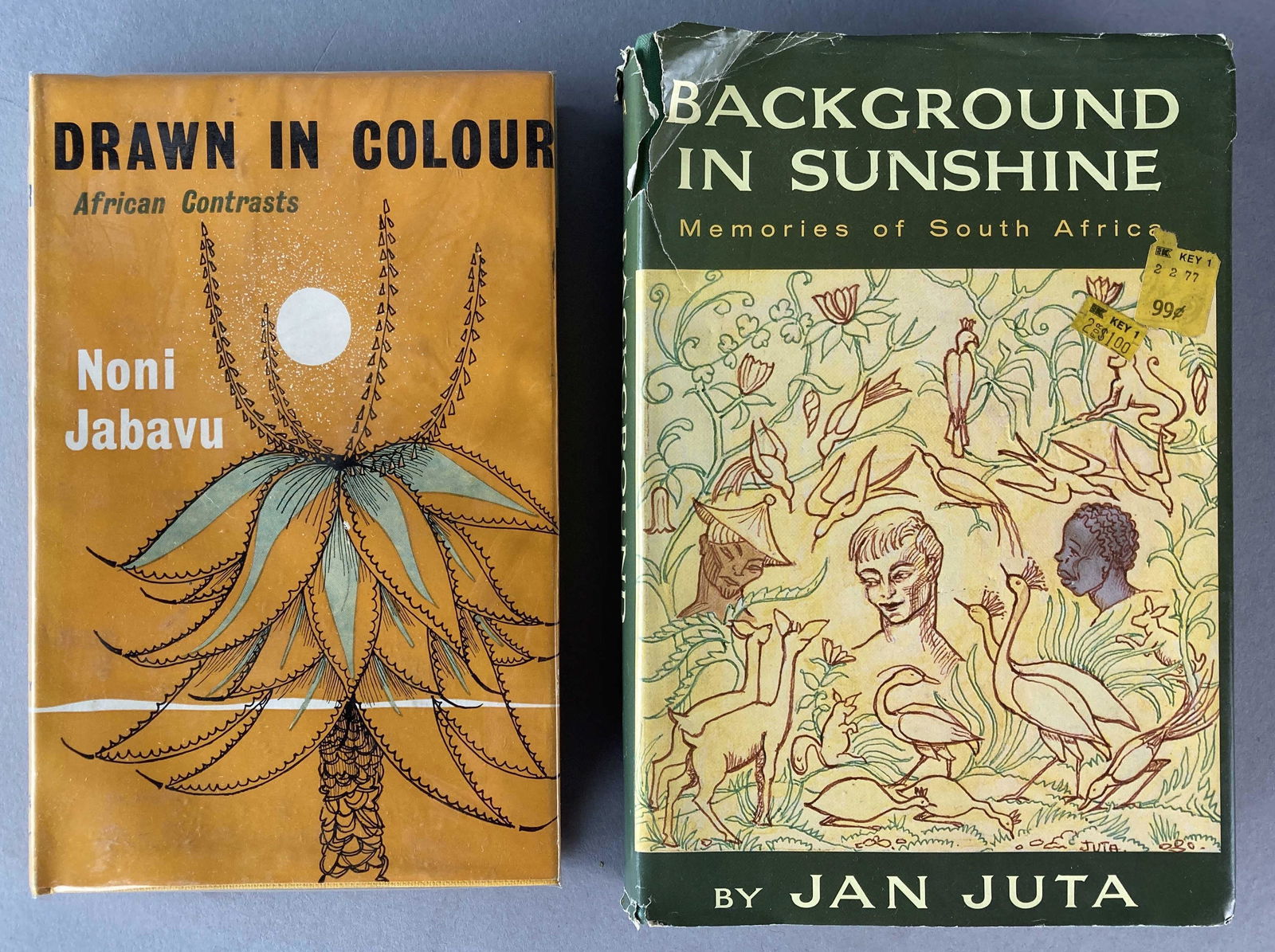 Two Hardcover Africa History Books 20th Century: Two lovely books on Afica complete with dust jackets. Drawn in Colour African Contrasts by Noni Jabavu, published by John Murray in London, 1966 sixth edition. Background in Sunshine Memories of South