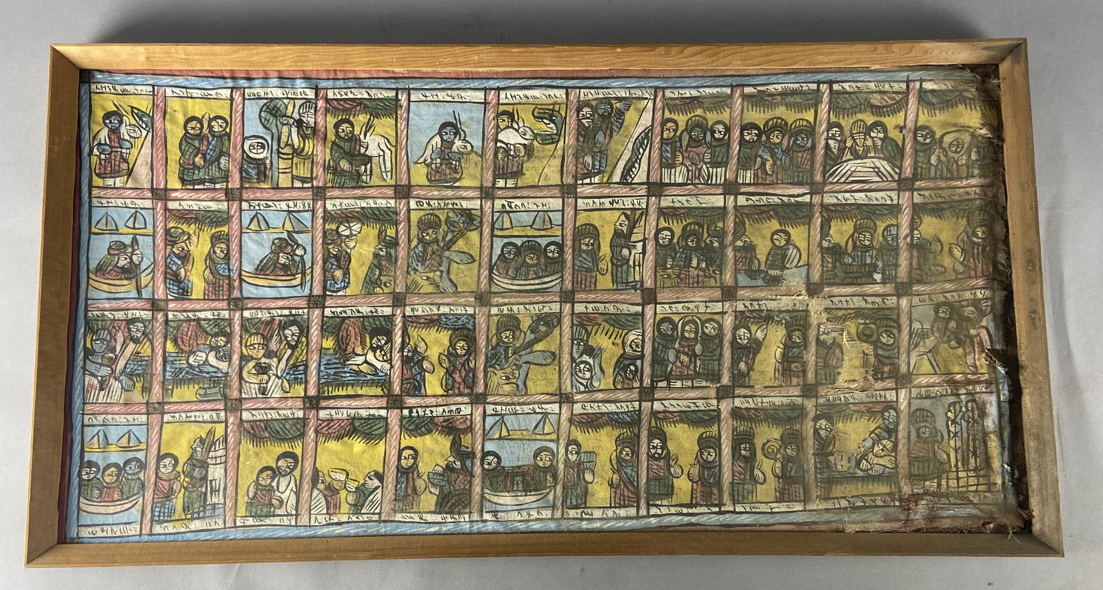 Coptic Ethiopian Linen Painting: Ethiopian Coptic story board, hand painted on stretched linen canvas. Retalbo art, possibly Christian in subject. Framed artwork is 42 X 22 inches in size.