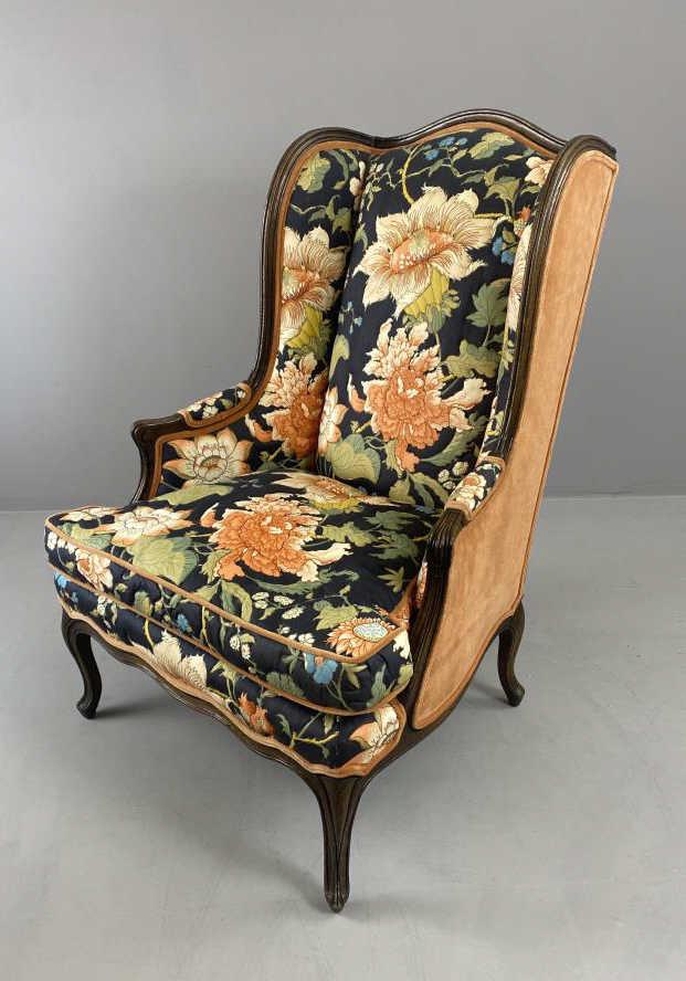 Henredon Country French Wing Chair C.1970s: Trapunto quilted large scale floral chintz on the front with velvet on the sides and back. The cushion appears to be down filled.Height 44-1/2", width 30", depth 32-1/2" SHIPPING INFO: Local pick-up o