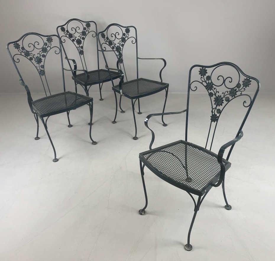 4 Woodard Daisy Chain Wrought Iron Armchairs: Set of 4 midcentury iron dining arm chairs from the Daisy Chain line of Woodard of Owosso. Height 36-3/4", width 20-3/4", depth 23-1/2" SHIPPING INFO: Local pick-up or third party shipping only for th