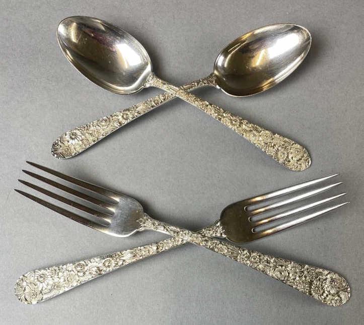 Alvin Sterling Bridal Bouquet 2 Forks, 2 Spoons: Two teaspoons and 2 dinner forks in sterling silver. They are in the "Bridal Bouquet" pattern introduced in 1932. The teaspoons measure 6" long, the forks 7-1/4". The total weight of the 4 pieces is 1