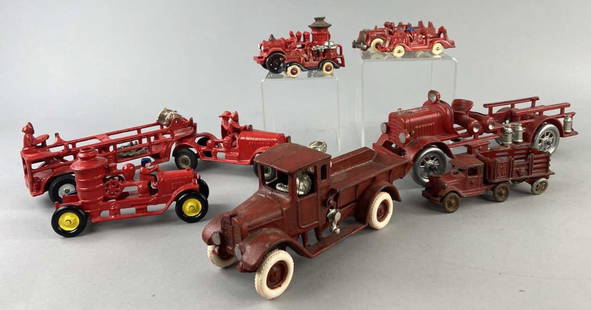 Cast Iron Fire Trucks and Engines: Arcade Mfg. cast iron international harvester dump truck, red with silver winch and driver. Kenton Toys fire engine, marked on underside. Arcade fire hose truck with two figures, marked on the bottom