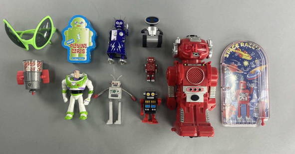 Robot and Space Toys Buzz Lightyear Wind Ups: New Bright 1984 Red Robot, untested, made in Hong Kong. BLack and red wind up robot pencil sharpener, marked Kikkerland. Small red mini robot desk clock, unmarked, label removed from back, untested. L