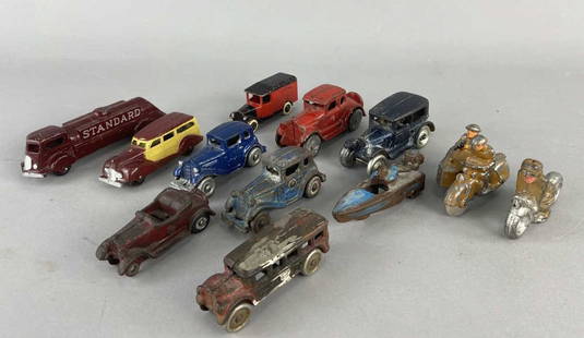 Dinky & Tootsie Toy Cars Motorcycles & Boat: Two blue Astin Martin cast iron cars, marked Astin on one side and Martin on the other. Red AC Williams cast iron Ford 5, unmarked. Blue Arcade cast iron sedan car from Freeport Ill. Blue cast iron mo