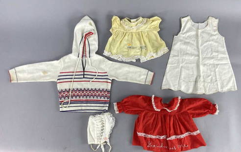 Vintage Baby Dresses Bonnet & Sweater: Red dress with white lace and embroidery. Pretty little red dress with collar and buttons down the back. Lace lines the collar and trimming the bottom of the skirt. Skirt also has the words Grandma Lo