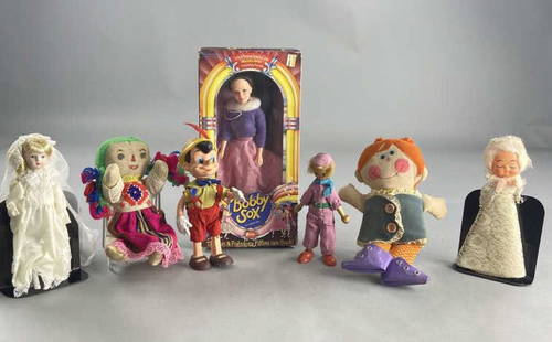 Pinocchio Bobby Sox Bride Dressy Bessy Dolls: Norma-Jean Bobby Sox Fashion Doll, still in original box, copyright 1987. Dressy Bessy Playskool teaching doll from 1970. Disney Pinocchio doll Marked R. Dakin & Company Walt Disney Productions Made i