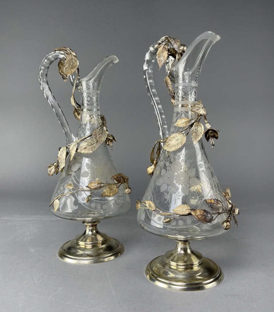 Pair Van Kempen 19th C. Dutch Silver Crystal Ewers: Pair of Dutch 19th century wine ewers in etched crystal with silver floral vine decoration. They bear the VK with crescent mark of JM Van Kempen on the base with the sword indicating the dates 1814-19