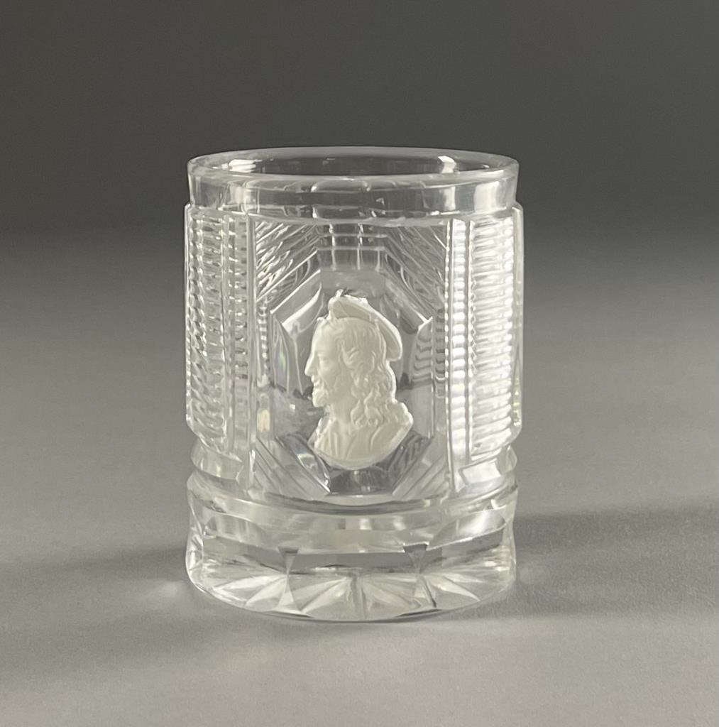 Attributed to Baccarat Christ Sulphide Tumbler: Heavy clear flint glass cut with pillars and horizontal ribbing and a bust of Christ sulphide encased in a medallion on one side. Possibly Baccarat. From the collection of Kenneth Beachler. Height 3-1