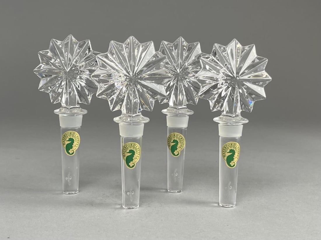 4 Waterford Star of Erin Crystal Bottle Stoppers: 4 Waterford Crystal bottle stoppers in the Stat of Erin pattern. Measures 5 1/4" tall. SHIPPING: In-House Shipping Available per our Terms and Conditions. Please read the Shipping Policy before biddin
