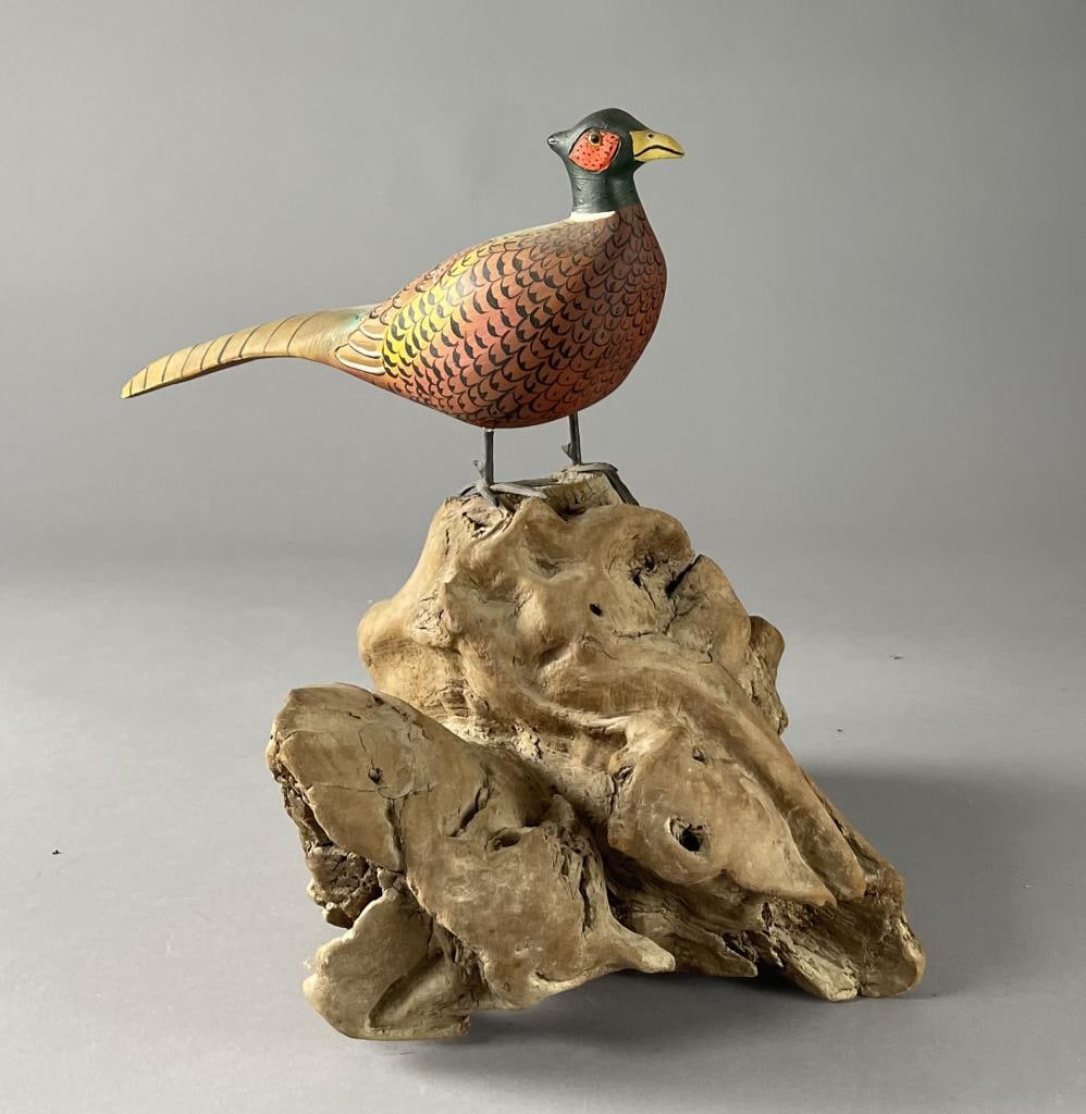 Carved and Painted Wooden Pheasant Sculpture: Hand made pheasant sculpture mounted on a driftwood base. Height 12-1/2". SHIPPING: In-House Shipping Available per our Terms and Conditions. Please read the Shipping Policy before bidding.
