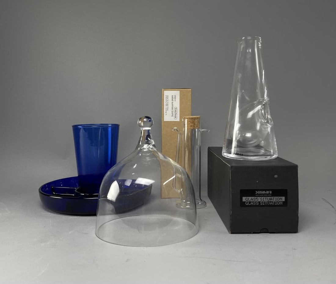 Midcentury Modern Glass MOMA, Droog, Cobalt: Includes a Droog Design Salad Sunrise blown glass vinegar and oil cruet, a Sugahara wine chiller decanter, a cobalt divided dish marked "Made in France", a cobalt vase, and a cloche dome cover. The co