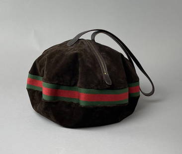 Gucci C.1970s Large Round Brown Suede Bag: Oustanding 1970s Gucci. Dark brown suede with signature green and red striped trim and leather strap. A unique unstructured bag with a round form related to a slouch, hobo or tote bag with a central